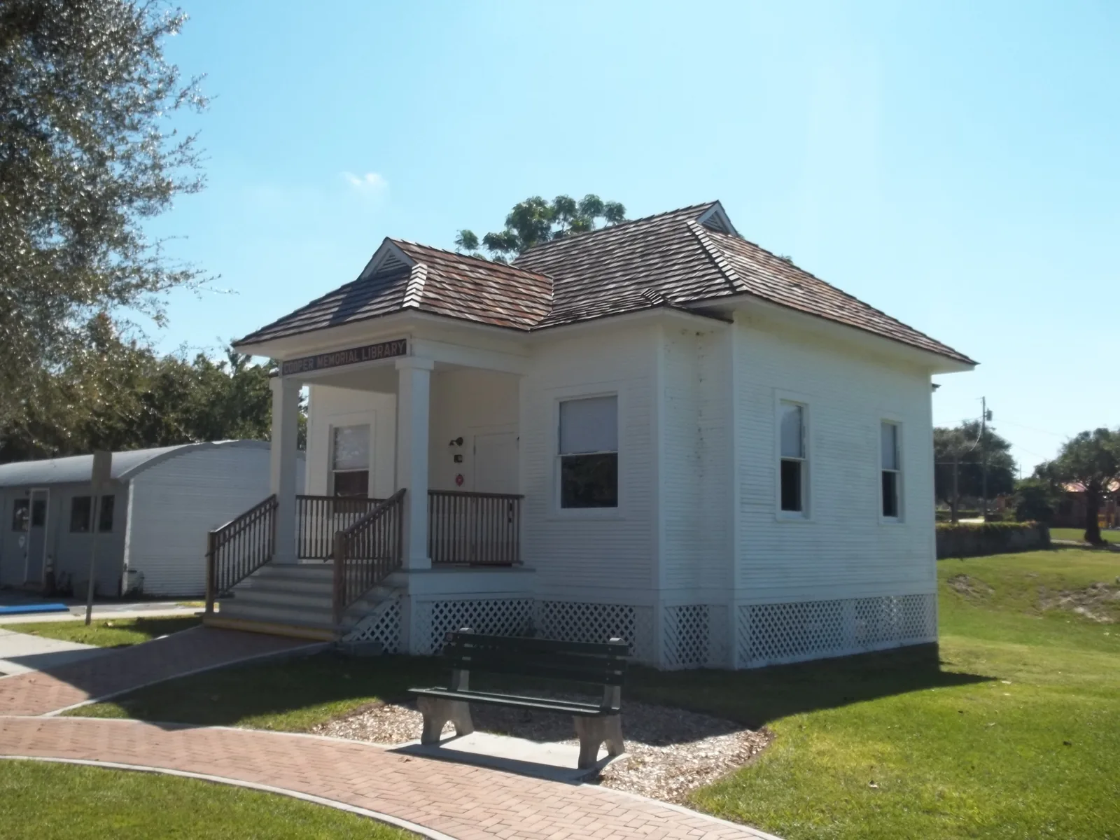 The original 1914 Cooper Memorial Library building, moved to the Clermont Historic Village in 2009.