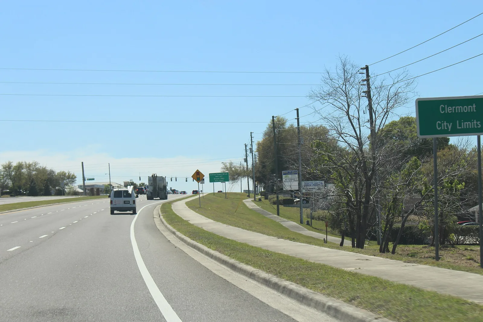 Power lines along southbound U.S. 27 at the Clermont city limit sign.