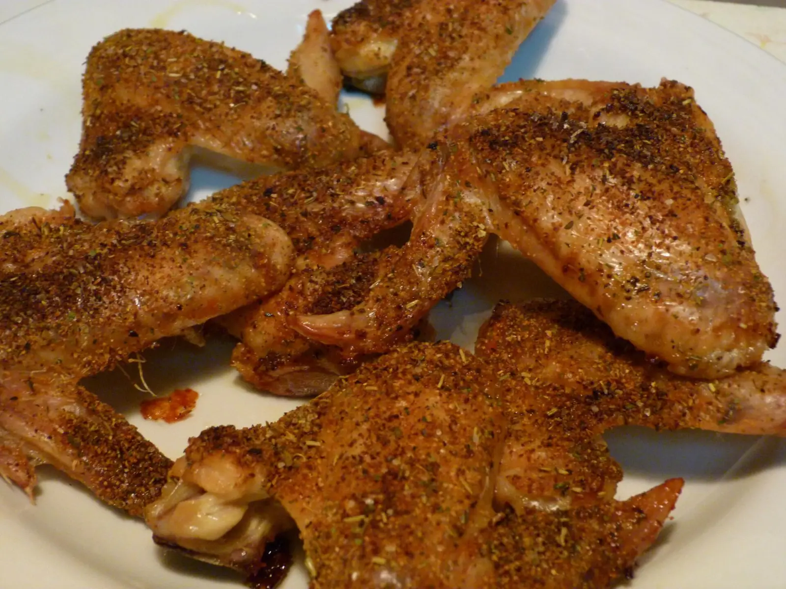 A plate of seasoned chicken wings. The photo was not taken at a Clermont restaurant.